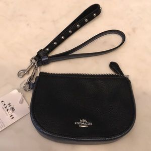 NWT Coach navy and black wristlet
